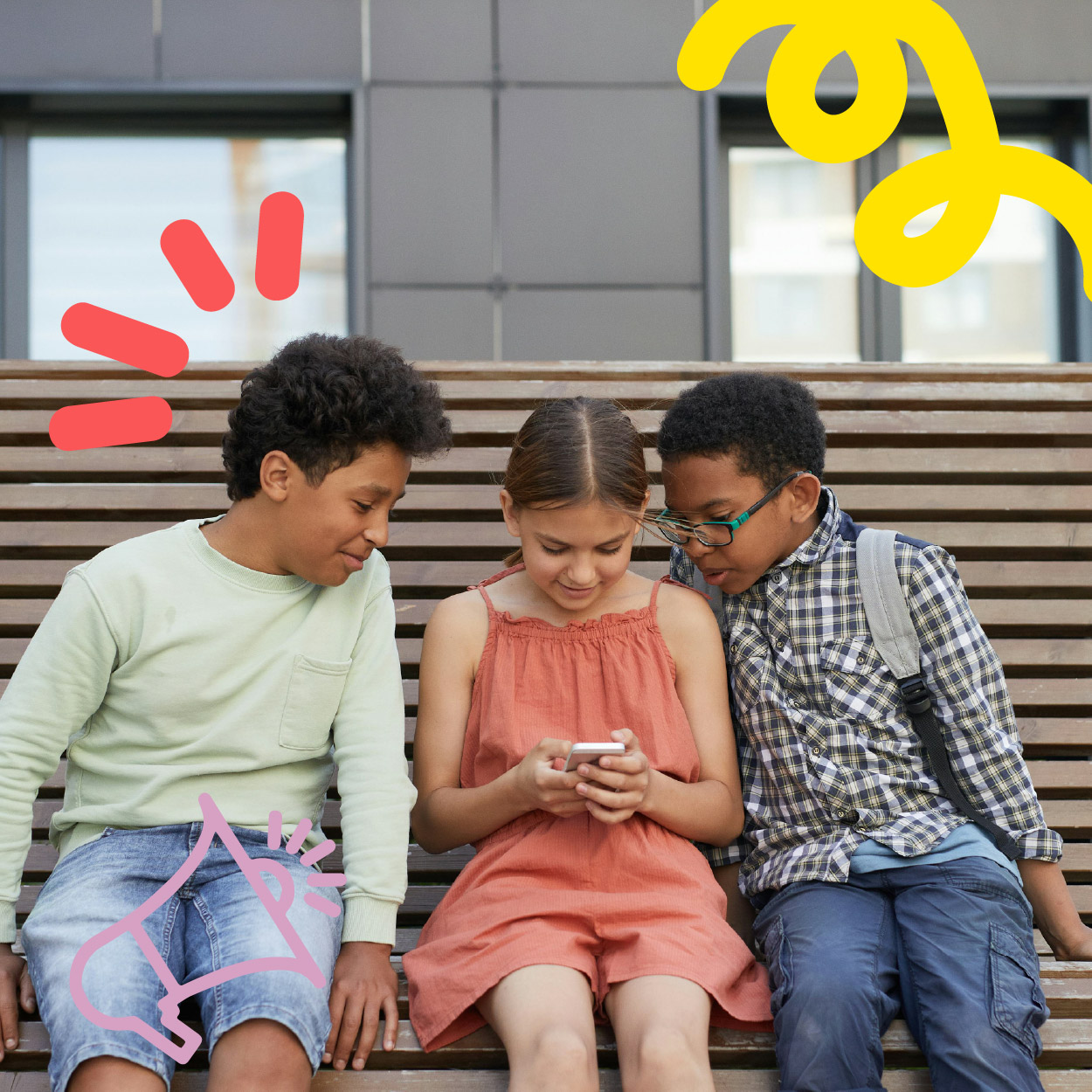 Kids on phones on bench